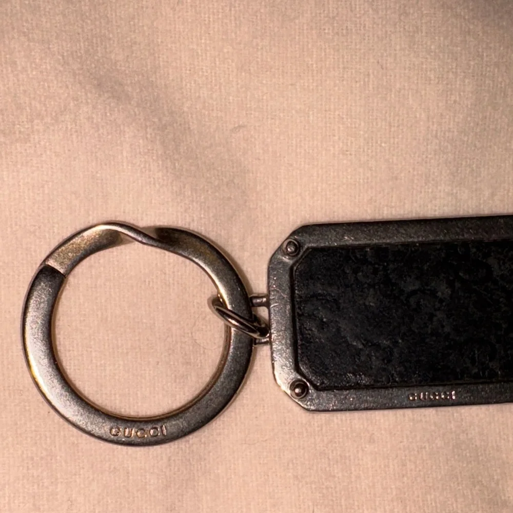 Black leather gg embossed guccissima Silver Keychain mens or womens as is